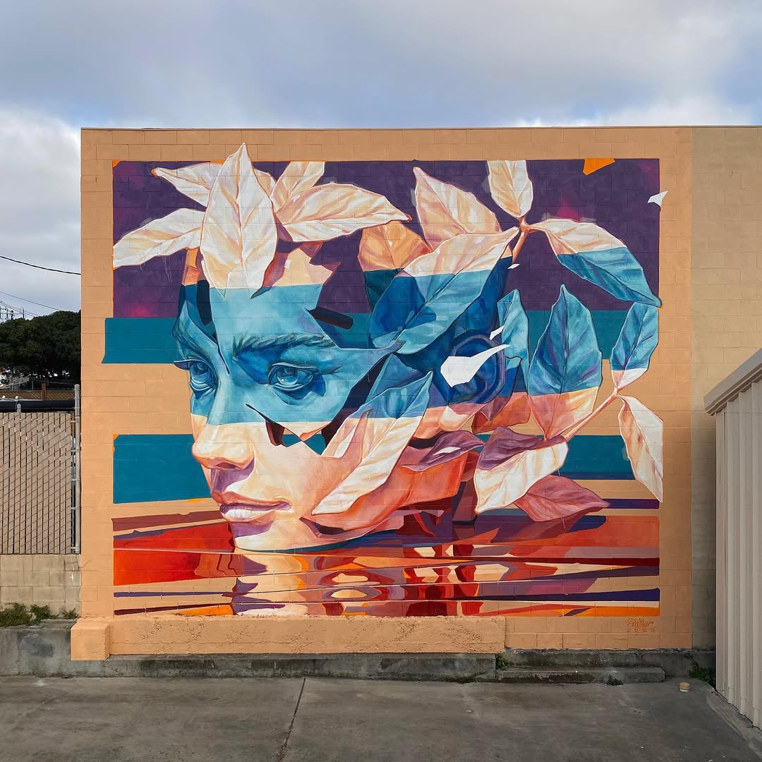 Architectural transformation through monumental mural art Building facade adorned with botanical portrait art