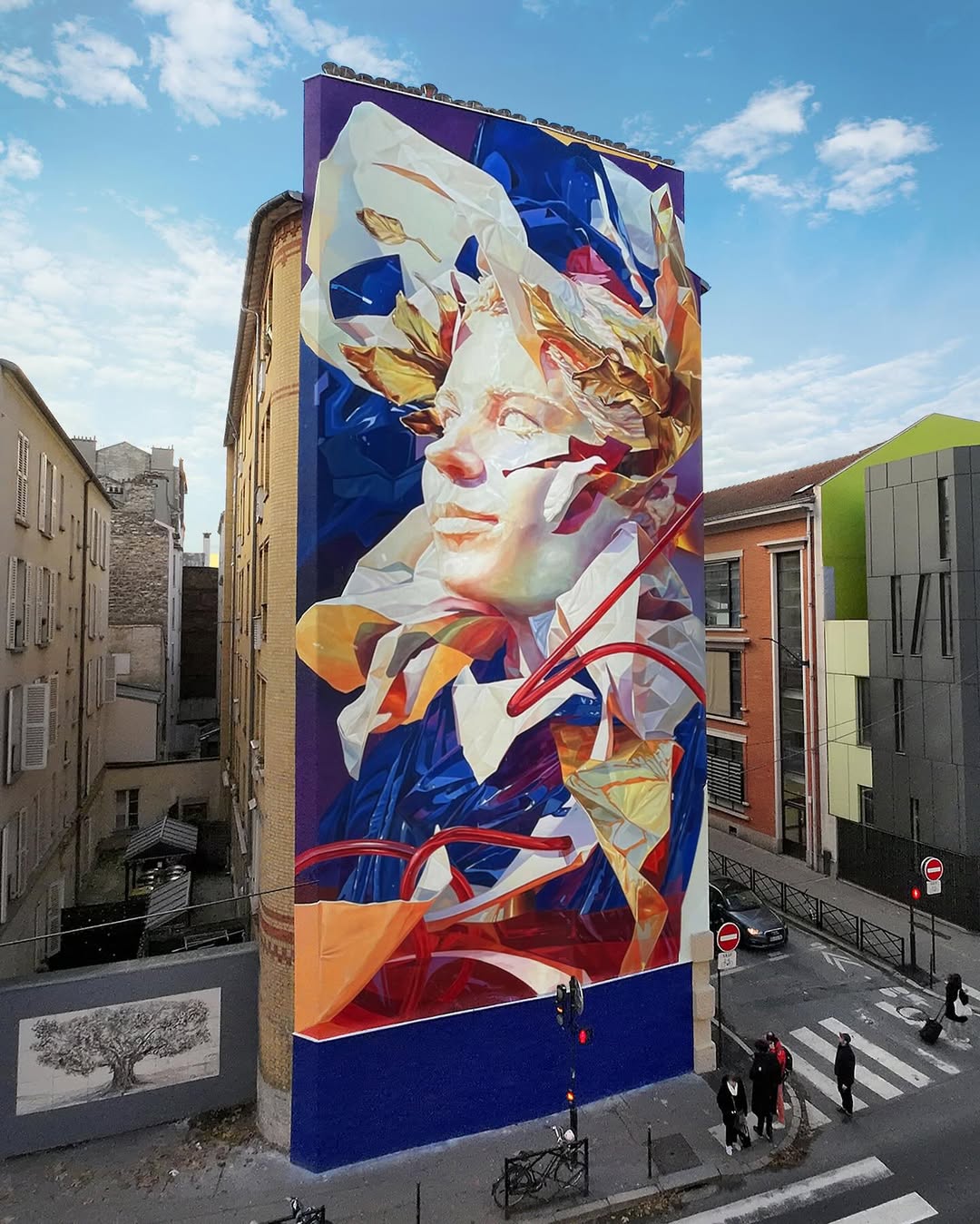 Creative street mural showcasing natural elements Street artwork combining botanical and portrait elements