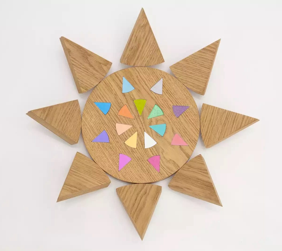 Example of contemporary Mexican cosmetic art featuring geometric patterns made from eyeshadows.