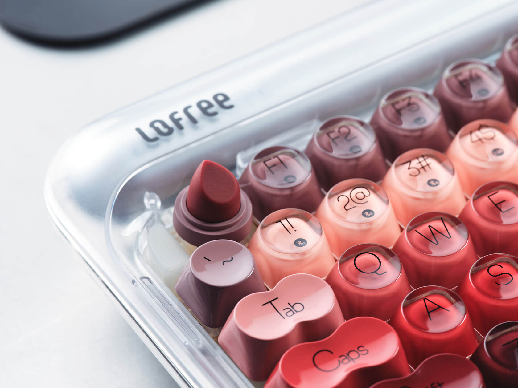 Gradient keycaps on frosted aesthetic mechanical keyboard in pink tones