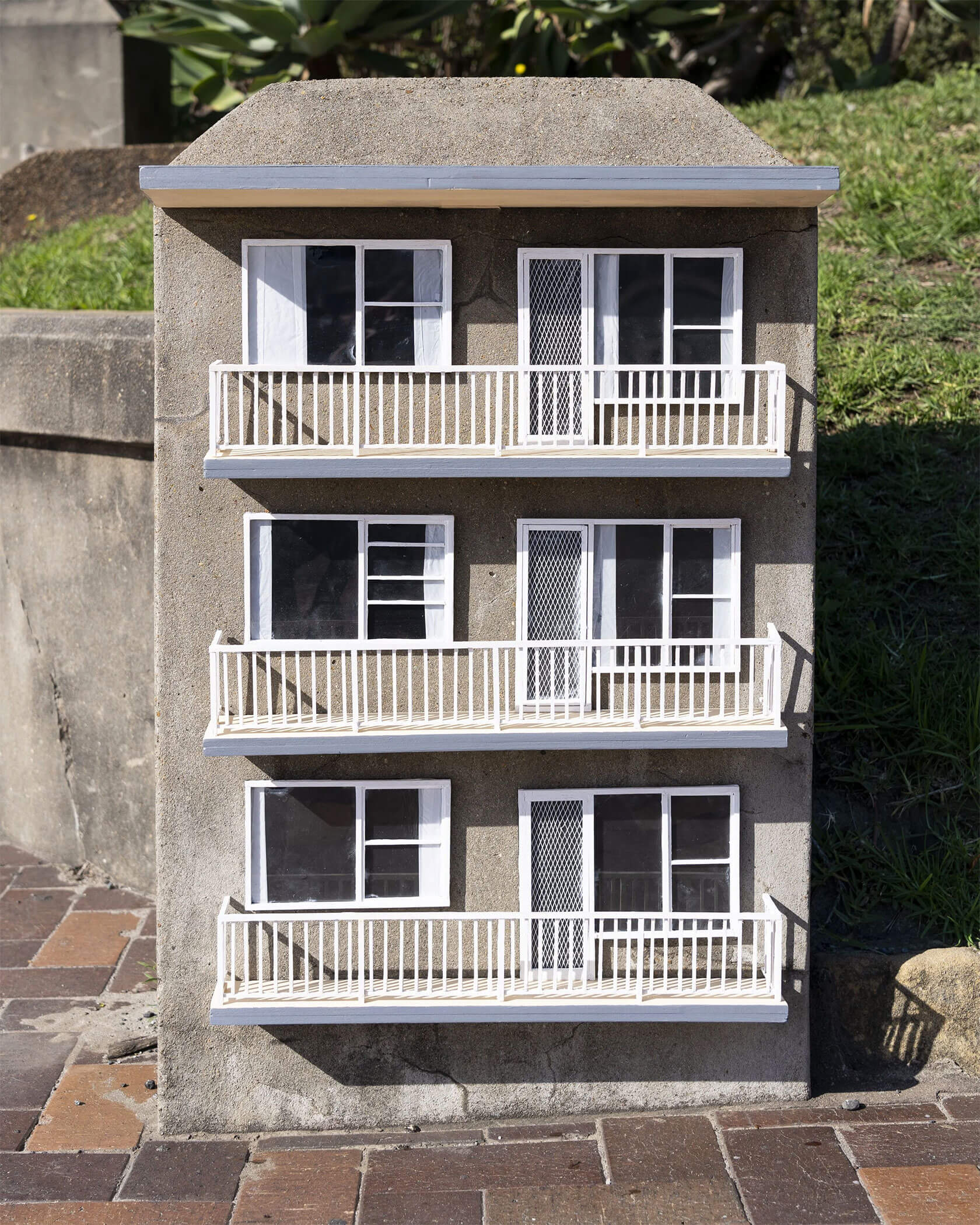 Sydney street artist Pederson executing public art intervention installations