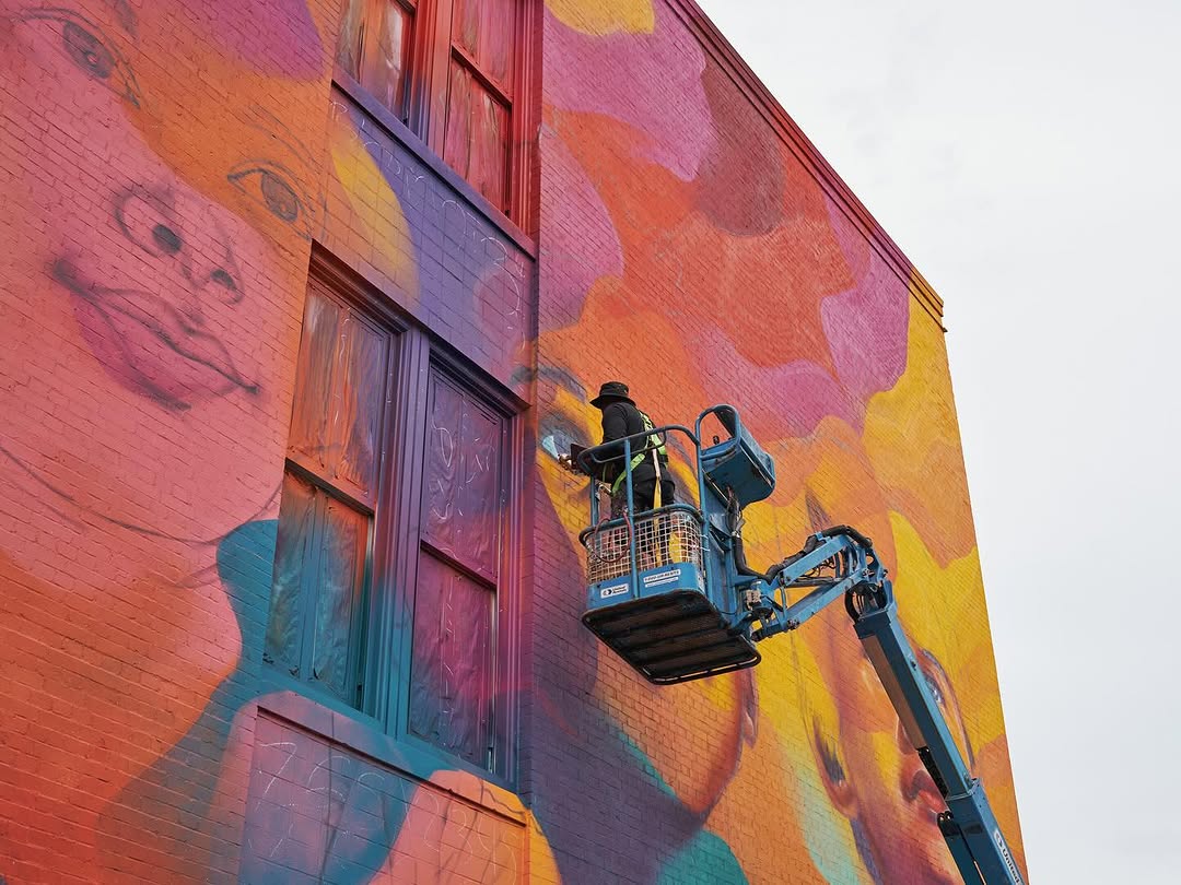 Vibrant street art murals showcasing bold abstract portraiture and dynamic urban wall art