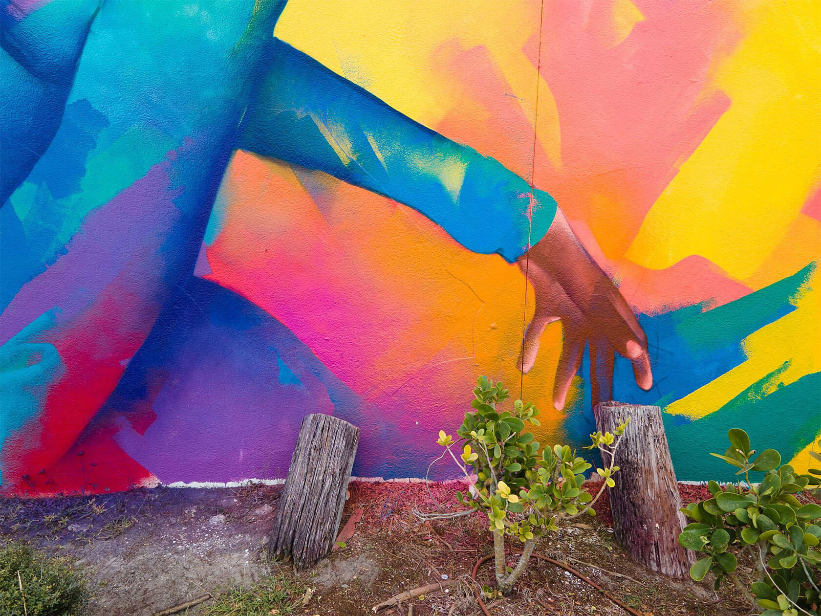 Abstract portraiture mural by street artist Thomas Evans featuring bold contemporary street art