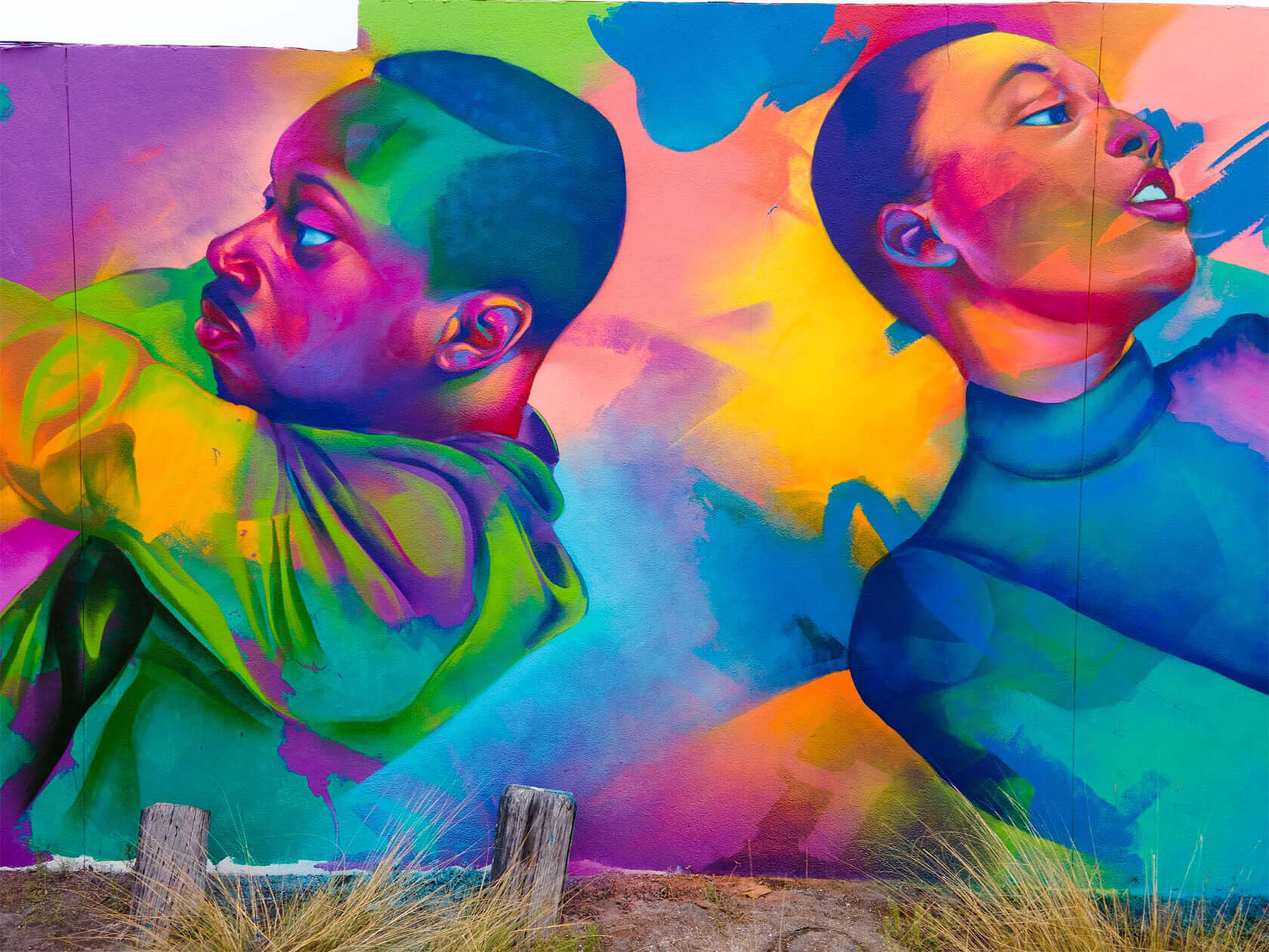 Contemporary street art mural with striking bold colors and dynamic composition