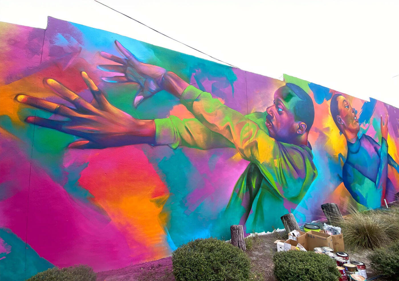 Featured street art murals with vibrant colors and bold contemporary design