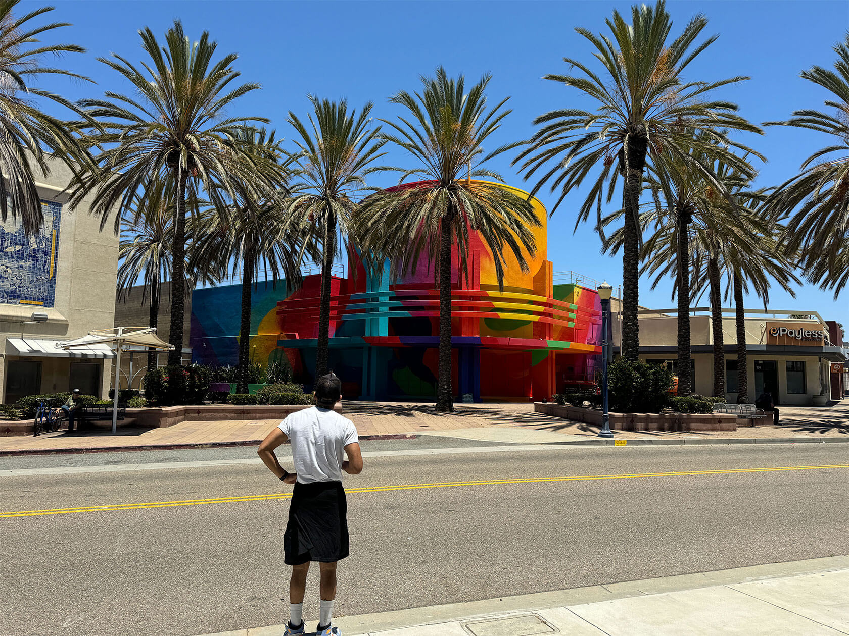 Street mural artist portfolio displaying vibrant urban wall art and colorful street murals